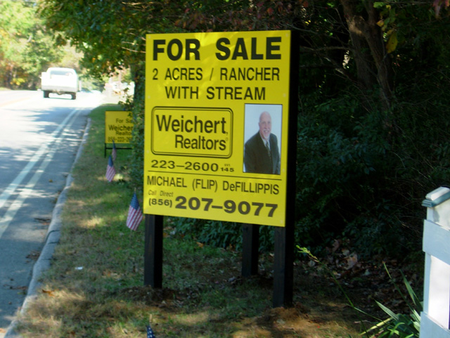 real estate for sale signs